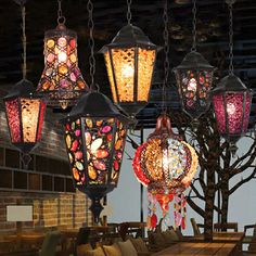 a group of colorful lights hanging from the ceiling