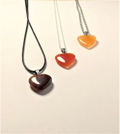 Genuine Carnelian heart shaped necklace Second image is to show the different shades of the carnelian hearts- if you have a preference please do let me know! Heart-shaped Carnelian Jewelry For Valentine's Day, Heart-shaped Natural Stones Necklaces For Jewelry Making, Carnelian Heart Gemstone Jewelry, Heart Shaped Carnelian Gemstone Jewelry, Carnelian Heart Shaped Gemstone Jewelry, Heart-shaped Carnelian Gemstone Jewelry, Heart-shaped Orange Necklace For Gift, Heart-shaped Healing Necklaces With Natural Stones, Heart-shaped Carnelian Necklace For Gift