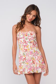 Discover the A Pop of Floral Strapless Mini Dress at BohoPink.com! Cute white floral print mini dress with bustier bodice. Express shipping is available!