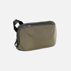 Slim Pouch - Olive — Aer | Modern gym bags, travel backpacks and laptop backpacks designed for city travel Modern Zipper Pouch Cases For On-the-go, Multifunctional Pouch Organizers With Pockets, Multifunctional Organizer Pouch With Pockets, Rectangular Organizer With Cell Phone Pocket For Daily Use, Multifunctional Pouch Organizer For Storage, Multifunctional Rectangular Pouch With Pockets, Multifunctional Organizer Pouch For Storage, Multifunctional Organizers With Removable Pouch For Storage, Functional Organizers With Pockets For Daily Use