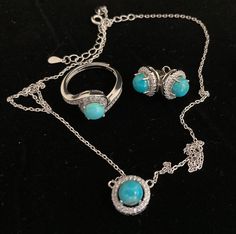 Add a touch of elegance, colour and sparkle to any outfit with this classic yet vibrant natural turquoise jewellery set. The 6mm blue turquoise cabochon-cut stones are beautifully contrasted with sparkling cubic zirconia and solid sterling silver plated with 14k white gold.  Sterling (.925) silver is a durable, versatile precious metal that when taken care of, can retain its brilliant, white shine and last a lifetime. How to care for your jewellery: Make sure these pieces are the last thing you put on and the first thing you take off. Always put your jewellery on after you apply any make-up, hair products or perfume to keep it looking its best for years to come. Turquoise Sterling Silver Jewelry For Party, Elegant Turquoise Round Jewelry Sets, Elegant Turquoise Jewelry Set For Party, Turquoise Jewelry Sets As A Gift, Formal Turquoise Jewelry With Matching Earrings, Turquoise Gemstone Jewelry For Party, Elegant Turquoise Necklace With Matching Earrings, Elegant Turquoise Necklace And Earrings Set, Turquoise Jewelry With Matching Earrings For Anniversary