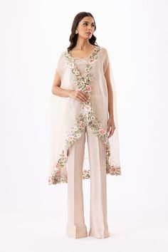 Aina – Sania Maskatiya International Festive Spring Cape Set, Party Pant Set With Sheer Dupatta, Beige Palazzo Set With Sheer Dupatta, Spring Wedding Pant Set With Sheer Dupatta, Spring Sharara With Sheer Dupatta, Organza Palazzo Set With Traditional Drape, Party Dupatta With Floral Embroidery And Cape Sleeves, Traditional Drape Pant Set For Wedding, Festive Sets With Floral Embroidery And Cape Sleeves