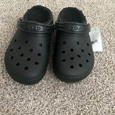 Its In Size 8 Womens. Brand Crocs. Great Condotion. They Have Not Been Worn Sense I Got Them Gifted To Me. Still Has Tag On Them. In Great Shape. Selling For 50 Black Clogs With Cushioned Footbed, Comfortable Black Clogs With Cushioned Footbed, Black Synthetic Clogs For Winter, Black Clogs With Cushioned Footbed And Round Toe, Black Non-slip Comfortable Clogs, Classic Black Clogs With Cushioned Footbed, Black Synthetic Clogs With Cushioned Footbed, Black Closed Toe Clogs With Cushioned Footbed, Comfortable Non-slip Black Clogs