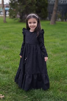 Kids Hijab Dress Almila Model Black Product Features   Fabric Feature: It is made of scalloped cotton fabric. It can be used in 4 seasons. Product Features : It is produced with Almila model festoon cotton fabric. The interior is fully lined with cotton. The front is threaded. Her shoulders are ruffled. It has a hidden zipper on the back. The sleeves are rubber. Note: This product is Black in color. If you are looking for a different color, visit our Etys store.  https://www.etsy.com/shop/Mevlan Kids Eid Dress, Kids New Model Dress, Solid Long Sleeve Dresses For Eid, Modest Black Dress For Eid, Black Modest Dress For Eid, Long Sleeve Solid Dress For Dress-up, Solid Color Long Sleeve Dress For Dress-up, Solid Long Sleeve Dress For Dress-up, Black Long Sleeve Dresses For Eid