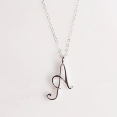 "Letter A Initial Necklace - Cursive \"A\" initial silver pendant - Personalized initial silver pendant for women / Gift for her / for mom Dainty \"A\" initial. Perfect every day necklace. Lovely gift for your self, sister, bridesmaids, new mom. Convo me if you would like to customize the length of the chain. The possibilities are endless. Pendant: Base metal is brass and 16K gold plated. Chain is 18 inches, sterling silver. (if you would like a longer or shorter chain, please contact us to cust Personalized Silver Monogram Charm Necklace, Personalized Monogram Silver Charm Necklace, Mother's Day Sterling Silver Monogram Charm Necklaces, Sterling Silver Monogram Charm Necklace For Mother's Day, Silver Monogram Charm Necklace For Mother's Day, Mother's Day Sterling Silver Monogram Charm Necklace, Silver Minimalist Personalized Initial Necklace, White Gold Initials Pendant Necklace, Silver Monogram Initial Pendant Charm Necklace