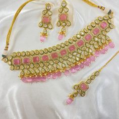 ✰ traditional Necklace set ✰ PLATING: Gold Finish ✰ SIZE : Free ✰ PACKING: Necklace Set ✰ Includes Matching Earrings / Maang Tikka ✰ We provide untracked FREE PARCEL DELIVERY in CANADA & USA on orders below $80. However, If you require Tracking information, please choose delivery upgrades while checkout. ✰ Products that are heavier and below $80 are delivered using STANDARD PARCEL for half the actual delivery price. ✰ We provide STANDARD FREE PARCEL DELIVERY IN CANADA & USA on all orders above $ Luxury Pink Temple Jewelry Necklaces, Luxury Pink Kundan Necklace For Wedding, Traditional Necklace, Parcel Delivery, Maang Tikka, Wedding Jewellery Necklace, Luxury Collection, Original Jewelry, Wedding Necklaces