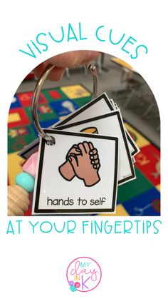 hands to self at your fingertips keychain with the words visual cues on it