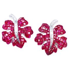 Ruby ear clip earrings design as classic luxury elegant style. You can use for everyday and also for the evening party. We use the top quality Ruby which make in invisible setting. We set the stone in perfection as we are professional in this kind of setting more than 40 years. The invisible is a highly technique .We cut and groove every stone .Therefore; we can guarantee the quality of setting. The Ruby is top quality .It is deep red and very sparking. Ruby use 25.20 ct, Diamond 0.46 ct G VS qu Blood Ruby, Diamond Dust, Earrings Design, Statement Earring, Lovely Jewellery, Clip Earrings, Leaf Earrings, Fine Silver, Evening Party