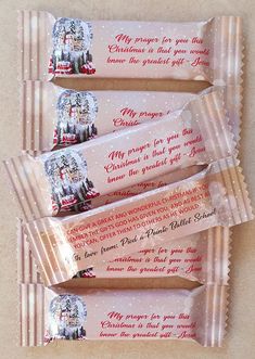 three candy bars with christmas messages on them