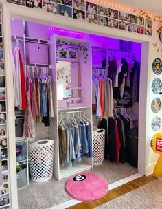 a closet with clothes and other items in it