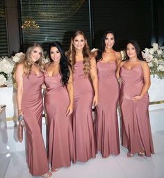 the bridesmaids are posing for a photo together