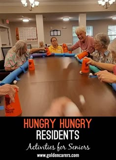 several elderly people sitting around a table with orange cups on it and the caption hungry hungry residents activities for seniors