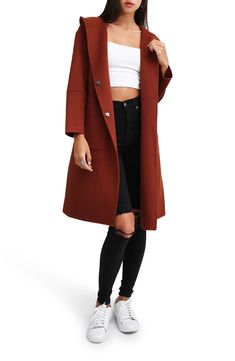 Crafted from a wool blend in a laid-back hooded silhouette, Walk This Way Coat is the essence of the smart-casual style that can be dressed up and down for any occasion. Hidden snap buttons, cropped sleeves and an oversized fit are the signature features of this gorgeous style. Boots or sneakers, jeans or boho dress - now you can elevate any look with this high quality, relaxed coat. Designed for an oversized fit. Take your usual size for the intended look or size down for a neater look. Do Not Oversized Brown Wool Coat For Fall, Chic Brown Pea Coat With Pockets, Oversized Brown Wool Coat For Work, Brown Lapel Collar Sweater Coat For Winter, Fall Wool Coat With Pockets, Solid Wool Coat With Pockets For Fall, Brown Sweater Coat With Pockets For Work, Brown Wool Coat With Lapel Collar For Spring, Brown Single-breasted Wool Coat For Spring