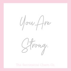 the sentimental charm co you are strong is written in grey on a light pink background