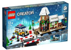 the box is open to show an image of a lego creator's christmas set