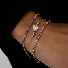 This exquisite handmade Natural Pink Sapphire Tennis Bracelet is the perfect accessory to sparkle on any occasion. Crafted in 14K/18K gold, this custom stacking bracelet showcases the September birthstone in a stunning design. Ideal as a Christmas gift, this one-of-a-kind piece of handmade jewelry is a must-have.𝐅𝐞𝐚𝐭𝐮𝐫𝐞𝐬:• 𝐌𝐚𝐝𝐞 𝐭𝐨 𝐎𝐫𝐝𝐞𝐫• 𝐌𝐞𝐭𝐚𝐥: 𝟏𝟒𝐊 | 𝟏𝟖𝐊• 𝐁𝐚𝐧𝐝 𝐂𝐨𝐥𝐨𝐫𝐬: Rose Gold, Yellow Gold & White Gold• 𝐂𝐮𝐬𝐭𝐨𝐦 𝐂𝐫𝐨𝐜𝐨𝐝𝐢𝐥𝐞 𝐋𝐨𝐜𝐤𝐒𝐭𝐨𝐧𝐞:•