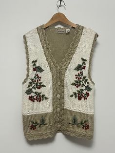 "Huntington Ridge vest with berries embroidery. Made in Korea 💯 % acrylic No pockets  Size large  Please see measurements for sizing  Neck 8\" Pit to pit 22\" Armhole 12\" Length 27\" Any questions just ask!  Shipping is included in purchase price.  Vintage item, regular wear due to age should be expected.  Any known flaws/marking will be listed. No returns / exchanges but please advise if there is an issue with your item" Grandma Vest, Casual Floral Embroidered Vest For Fall, Sleeveless Embroidered Vest For Fall, Embroidered Sleeveless Vest For Fall, Fitted Floral Embroidered Vest For Fall, Fall Cotton Embroidered Vest, Fall Embroidered Cotton Vest, Casual Fitted Vest With Floral Embroidery, Casual Embroidered Sleeveless Vest