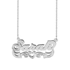 Bold, bright, and beautiful are the first words that come to mind when seeing this stunning rhodium beaded nameplate necklace. Completely covered in sparkle, the whimsical script, with beading and rhodium on the first letter, shines and is accented by the heart with beading and rhodium adorned tail that underlines the nameplate. The backdrop shadow draws even more attention to this shimmering 14K Yellow Gold Over Sterling Silver necklace by creating a contrast behind the beaded letter and making each letter pop. Feminine, fabulous and completely customizable, you can personalize this rhodium beaded nameplate necklace with up to 12 characters. Included with each charm is an 18" Link Chain that is fastened on both sides of the nameplate. For adult women. Size: one size.  Gender: female. Silver Nameplate Necklace For Wedding, Silver Heart Nameplate Necklace With Custom Name, Silver Heart Necklace With Custom Name Nameplate, Silver Name Necklaces For Valentine's Day, Silver Custom Name Heart Necklace, Silver Heart Nameplate Necklace, Silver Nameplate Heart Necklace, Silver Nameplate Jewelry With Names, Customizable Silver Heart-shaped Name Necklace