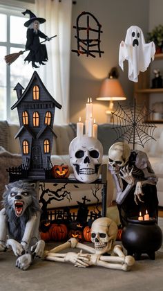 halloween decorations with candles and skeletons on the floor