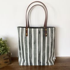 "Small, simple tote with just enough room to fit a notebook, piano books or laptop.  Specs: Approx 15\"x14\" Faux leather straps Small gusset bottom 2 interior slip pockets Add a matching coin purse, boxy bag or coordinating pouch for more interior storage ideas! Or for gifting!" Everyday Striped Canvas Bag, Everyday Tote Canvas Bag With Striped Lining, Everyday Canvas Tote Bag With Striped Lining, Everyday Use Canvas Tote Bag With Striped Lining, Interior Storage Ideas, Tote Aesthetic, Boxy Bags, Aesthetic Bags, Simple Tote