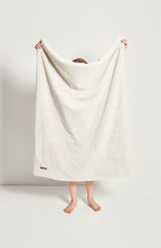 This extrasoft and superfluffy blanket is a cozy delight in a perfect size for any bed, couch or reading chair. 33" x 44" 100% polyester Machine wash, tumble dry Imported Faux Fur Throw Blanket, Faux Fur Blanket, Fur Throw Blanket, Lightweight Blanket, Fur Blanket, White Blanket, Reading Chair, Bed Couch, Cooling Blanket