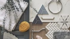 a kitchen counter top with various items on it and a towel hanging from the wall