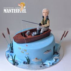 there is a cake that has a fisherman on it