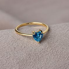 We crowned the heart symbol, which is a symbol of love, friendship and many other affections, with precious stones. Now you can see the love at your finger. Other Products Compatible with Our Blue Topaz Heart Ring: https://artdiamonds.etsy.com/listing/1391133396/blue-topaz-heart-necklace14k-solid-gold?utm_source=Copy&utm_medium=ListingManager&utm_campaign=Share&utm_term=so.lmsm&share_time=1694013074312 F E A T U R E S * Made to Order. * Gold KT: 14K * Gold Color: Yellow Gold, Rose Gold, White Gold * Blue Topaz Carat: 1.00 ct. * Stone Height: 7,12 mm / 0.28 inch * Stone Width: 6,12 mm / 0.24 inch * Setting Type: Bezel Setting * Ready to Ship in 1-3 Business Days * 100% US sourced * 2 Years Warranty * Free Express International Shipping * Free returns within 14 days from the order date Heart Heart Cut Topaz Gemstone Ring For Promise, Heart Cut Topaz Ring For Promise, Heart Cut Topaz Promise Ring, Heart-shaped Topaz Ring For Gift, Heart-shaped Topaz Gemstone Ring For Gifts, Heart-shaped Topaz Promise Ring, Heart Cut Topaz Ring Birthstone As A Gift, Heart Cut Topaz Birthstone Ring For Gifts, Gift Heart Cut Blue Topaz Rings