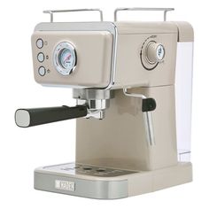 an espresso machine sitting on top of a counter