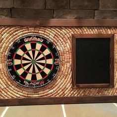 a wooden frame with a dart in it