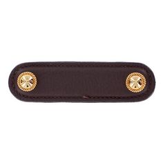 a brown leather key chain with two gold buttons