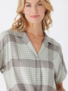 The Sheena Woven Button Up is crafted from 100% sustainable lenzing viscose for guilt-free fashion. It features a drop shoulder design and tie front detail, adding an elevated and stylish touch to any outfit. Summer Viscose Button-up Tops, Summer Button-up Viscose Tops, Viscose Button-up Summer Tops, Casual Viscose Tops With Button Closure, Casual Button-up Viscose Tops, Summer Viscose Button-up Blouse, Summer Button-up Viscose Blouse, Relaxed Fit Viscose Button-up Blouse, Relaxed Fit Button-up Viscose Blouse