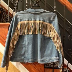 Chico’s Light Wash Denim Fringe Jacket Size 2 Nwt Excellent Condition No Flaws Color: Light Wash With Tan Fringe Fringe Denim Button Closure Long Sleeve Hans Pockets Cotton, Polyester, Rayon, Spandex Machine Wash Length: 24” To 25” Chicos Has Stirred Up A Little Drama On This Denim Jacket, Adding Soft Faux Suede Fringe To The Back And Sleeves For A Memorable Exit. This Classic Silhouette Is Just Right For Your Casual Style Featuring A Button Front Closure And Pockets. Chico’s, Denim, Denim Fring Casual Spring Outerwear For Rodeo, Spring Rodeo Outerwear With Pockets, Spring Rodeo Outerwear With Fringe, Medium Wash Outerwear For Rodeo In Fall, Cotton Denim Jacket With Fringe, Fall Denim Outerwear With Fringe, Long Sleeve Cotton Denim Jacket With Fringe, Long Sleeve Cotton Denim Jacket For Rodeo, Spring Long Sleeve Denim Jacket For Rodeo