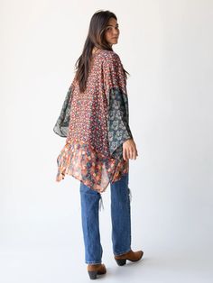 Throw-on-and-Go with the Sierra Kimono! The mixed print patterns and earthy tones flow as beautifully as the kimono itself! Throw it on with jeans and your favorite layering tee. This cute kimono will be the one you reach for again and again! Multicolor Printed Kimono For Day Out, Oversized Bohemian Patchwork Tops, Oversized Hippie Tops For Fall, Casual Fall Blouse With Unique Print, Oversized Patchwork Blouse For Spring, Casual Patchwork Kimono For Fall, Oversized Bohemian Top For Day Out, Bohemian Oversized Top For Day Out, Flowy Multicolor Fall Kimono