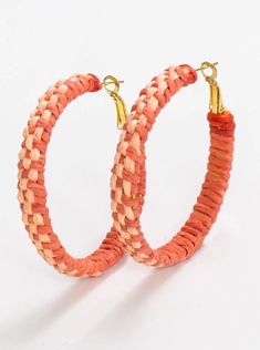 Elevate your style with our stylish Ink & Alloy Woven Hoops. Crafted with stunning coral woven hoops, these earrings will add a touch of elegance to any outfit. Stand out from the crowd and make a sophisticated statement with these exclusive hoops. Coral