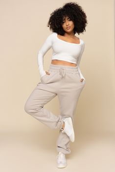 Whether it's a cozy night in or a take-it-slow Sunday morning, the Ooey Gooey Sweatpants were designed to match your comfort cravings. Pair with the Ooey Gooey Half Zip for the ultimate cozy set. Fit Stylist Tip: Thanks to its versatile waistband, you can roll it over for a low-rise fit or, keep it high-waisted! Long Sleeve Shrug, Short Bra, Zip Coat, Shorts Sweatpants, Bra Dress, Swim Shop, Comfy Tops, Short Leggings, Romper Dress