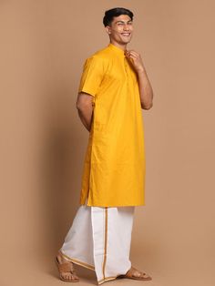 VASTRAMAY Men's Mustard Cotton Kurta And Mundu Set Add a touch of tradition to your wardrobe with this mustard cotton kurta and mundu set from VASTRAMAY. Perfect for special occasions or festive events, this set offers comfort and style. The kurta features a classic design with intricate detailing, while the mundu adds an elegant touch. Made from high-quality cotton, this set is easy to maintain and durable, ensuring long-lasting wear. Features: Mustard cotton kurta with intricate detailing Come Yellow Cotton Silk Kurta With Pallu, Cotton Silk Kurta For Puja During Transitional Season, Transitional Cotton Silk Kurta For Puja, Cotton Kurta With Pallu For Diwali, Diwali Cotton Kurta With Pallu, Traditional Mustard Cotton Kurta, Yellow Cotton Traditional Wear For Eid, Yellow Cotton Kurta With Dabka Detail, Unstitched Cotton Kurta With Pallu