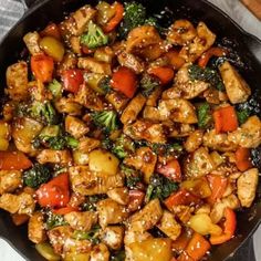 chicken and vegetable stir fry in a skillet