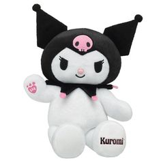 a white and black stuffed animal with pink eyes