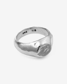 Energised with the resolve to uphold every pledge, the Oath Signet Ring safeguards all solemn commitments. Crafted from 925 Sterling Silver, this signet ring introduces a circular facade that gracefully melds into its thick body, and features a polished, yet time-worn, hand-hewn texture. This demi-fine piece is a versatile addition to any jewelry collection, suitable for all genders and expressions. Perfect for easy, everyday styling on its own or as a complement to any ring stack. Sold individu Thick Ring, Silver Signet Ring, Gold Signet Ring, Detailed Ring, Demi Fine Jewelry, Ring Fit, Online Jewelry Store, Ring Size Guide, Ear Studs