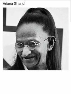 an image of a woman with glasses and long hair smiling at the camera, texting ariaa ghandi