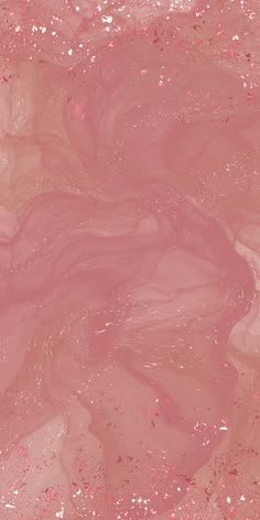 an abstract pink and gold marble background with lots of glitter on the top right corner