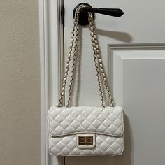 Fancy White Bag With Tufted Pattern And Classy Gold Hardware, Similar To Chanel. Great Bag For Formal Events. Never Worn/Used And Technically New With The Exception Of Mild Signs Of Wear And Tear Such As Minor Peeling/Discoloration/Creasing As A Result Of Being Stored For Some Time. Spacious Inside. The Chain Can Be Converted From Shoulder Bag Length To Crossbody Length. White Chain Shoulder Bag, White Crossbody Bag With Chain, White Chain Crossbody Bag, White Shoulder Bag With Chain For Everyday, White Chain Shoulder Bag For Everyday Use, White Flap Shoulder Bag With Chain Strap, White Crossbody Evening Bag, White Chain Strap Shoulder Evening Bag, White Clutch Evening Bag With Chain Strap