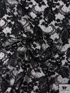 This black floral double-scalloped corded lace designer fashion fabric is extremely elegant and high quality. SKU: 12270 Content: Polyester Color: Black Width: 52 inches This fabric is a last cut and no longer in production. Once sold out, we are unable to get more. Black Lace Fabric Pattern, Fitted Crochet Lace For Party, Elegant Stretch Lace For Spring, Spring Party Lace With Contrast Detail, Party Black Lace With Contrast Detail, Black Lace For Spring Party, Elegant Crochet Lace For Party, Black Scalloped Lace For Party, Black Lace With Lace Trim For Party