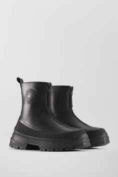 Crafted in ultra-luxe leather, the Kya Boot has a front zip closure for effortless wear in a sleek silhouette. With the same deep-tread sole as our Journey Boot and a rubber protective wrap, the Kya Boots are equally durable as they are versatile. Available in a palette of elevated neutrals, the Kya will become your go-to multi-season staple Elevated Neutrals, Journey Boots, Canada Goose Logo, Tan Ankle Boots, Baby Outerwear, Leather Boot, Our Journey, Boots And Sneakers, Black Label