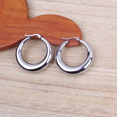 Chunky hoop earrings. Dimensions: 40 mm. Thickness from 4 mm to 8.5 mm. The hoops are made of hypoallergenic stainless steel, water resistant and weather resistant. To maintain their shine, it is advisable not to expose them to aggressive products such as shampoos, soaps, perfumes. Delivered with an organza gift bag. Sending by followed letter. Tarnish Resistant Stainless Steel Hoop Earrings, Nickel-free Small Hoop Stainless Steel Earrings, Nickel-free Small Stainless Steel Hoop Earrings, Nickel-free Stainless Steel Small Hoop Earrings, Modern Small Hoop Stainless Steel Earrings, Small Stainless Steel Nickel-free Hoop Earrings, Minimalist Nickel-free Stainless Steel Hoop Earrings, Trendy Small Hoop Stainless Steel Earrings, Nickel-free Minimalist Hoop Earrings In Surgical Steel