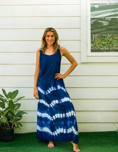 Embrace the summer with this Shibori Indigo Hand Dyed Dress. Ideal for beach outings, lounging at home, or casual summer wear, this dress is handmade from soft and comfy 100% rayon. With an adjustable racerback style, it offers a flexible fit for various body types.  Key Features * Material: Soft and comfy 100% rayon * Style: Adjustable racerback knot dress * Design: Hand-dyed Shibori pattern in indigo and white * Length: 54 inches from the high point of shoulder to hem * Bust: Fits bust sizes 3 Casual Tie Dye Dress For Beach Cover-up, Casual Tie-dye Dress For Beach Cover-up, Casual Tie Dye Beach Dress, Summer Tie Dye Dresses With Natural Dye, Summer Tie Dye Dress With Natural Dye, Summer Tie-dye Dress With Natural Dye, Hand Dyed Maxi Dress For Beach, Hand Dyed Maxi Dress For Spring Vacation, Casual Tie Dye Beach Dress For Festival