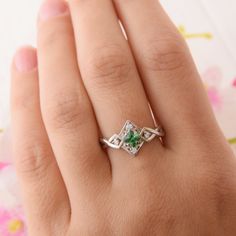 "Vintage style 925 sterling silver art deco emerald promise ring for her, Unique geometric celtic style womens emerald engagement ring WE OFFER UNLIMITED PERIOD INSTALLMENTS PLAN This is a beautiful, stunning, feminine ring that works well for all occasions, styles, and ages. You will love it! Ring information Main stone: Emerald Approximate size: 4x4mm Accent stones: White cubic zirconia Approximate size: 1.5mm (4 stones) Metal type: Silver Metal stamp: 925 Sterling SIlver Customization / Repla Elegant Princess Cut Emerald Ring For Promise, Elegant Princess Cut Emerald Promise Ring, Promise Jewelry With Emerald Birthstone, Emerald Birthstone Jewelry For Promise, Exquisite Silver Jewelry For Promise, May Birthstone Jewelry With Prong Setting In Princess Cut, Emerald Birthstone Ring For Promise, Silver Promise Jewelry With Birthstone, Emerald Cut Birthstone Jewelry For Promise