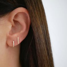 The Gold Mini Bar Stud Earring keeps every stack right in line. Featuring a solid 14k gold bar, this shiny stud can be angled left, right, up, down—and definitely around town. Tiny Diamond Earrings, Earring Inspo, Huggie Earring, Love Sparkle, Bar Stud Earrings, Bar Studs, Diamond Glitter, Diamond Bar, Eternity Band Ring