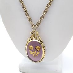 "Whiting Davis Roses Pendant Necklace, Vintage Pastel Glass Oval with Intaglio Carved Flowers in Gold on Gold Tone Chain Measurement * 24\" chain; 2\" x 1-1/4\" pendant Condition * Very nice condition. Gently used. Size: Womens 24\" Condition: Pre-Owned Good" Vintage Oval Jewelry With Rose Design, Victorian Gold Jewelry With Rose Design, Vintage Rose Design Jewelry For Formal Occasions, Antique Gold Jewelry With Rose Design, Oval Rose Design Jewelry For Wedding, Vintage Rose Design Pendant Jewelry, Victorian Rose Design Jewelry For Formal Occasions, Vintage Hallmarked Oval Cabochon Necklace, Formal Engraved Necklace With Oval Cabochon